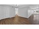 Bright living room featuring hardwood floors and ample storage with a large closet at 6851 Roswell Rd # C7, Atlanta, GA 30328