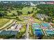 Comprehensive aerial view highlighting the community's golf course and tennis courts at 8 Collier Nw Rd # A1, Atlanta, GA 30309