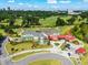 Beautiful aerial view of a golf course clubhouse, showcasing the architecture and landscaping at 8 Collier Nw Rd # A1, Atlanta, GA 30309