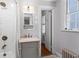 Clean and tidy bathroom with shower, tub, vanity, and window at 8 Collier Nw Rd # A1, Atlanta, GA 30309