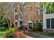 Beautiful brick building with well-manicured landscaping and a welcoming entrance at 8 Collier Nw Rd # A1, Atlanta, GA 30309