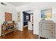 Hallway featuring a rattan bar cart and view into the dining room at 8 Collier Nw Rd # A1, Atlanta, GA 30309