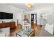 Inviting living room with open layout, hardwood floors, and a comfortable seating area at 8 Collier Nw Rd # A1, Atlanta, GA 30309