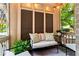 Charming porch with comfortable seating and lush greenery at 8 Collier Nw Rd # A1, Atlanta, GA 30309