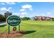 Welcome sign to the Ralph Foster Hard Courts, with lush greens in the background at 8 Collier Nw Rd # A1, Atlanta, GA 30309