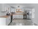 Bright kitchen with stainless steel appliances, light cabinets, and butcher block countertops at 1322 Thurgood Sw St, Atlanta, GA 30314