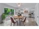 Eat in kitchen area with stainless appliances and tile floors at 1322 Thurgood Sw St, Atlanta, GA 30314