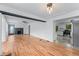Spacious living room with hardwood floors, a fireplace, and natural light at 1322 Thurgood Sw St, Atlanta, GA 30314