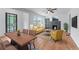Inviting living room with a fireplace, hardwood floors, and lots of natural light at 1322 Thurgood Sw St, Atlanta, GA 30314