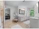 Bright bathroom with lots of counter space, white cabinets, and a view to the bedroom at 1811 Fountain Hill Ct, Duluth, GA 30097