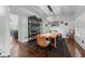 Stylish dining room with hardwood floors, a unique light fixture, and modern decor at 1811 Fountain Hill Ct, Duluth, GA 30097