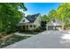 Charming traditional home features a welcoming front porch and a spacious, attached two-car garage at 1811 Fountain Hill Ct, Duluth, GA 30097