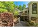 Exterior elevation with deck, stairs, and retaining wall at 1811 Fountain Hill Ct, Duluth, GA 30097