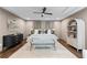 Calming main bedroom suite features a tray ceiling, neutral tones, and stylish decor at 1811 Fountain Hill Ct, Duluth, GA 30097