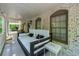 Inviting porch with a hanging swing bed, perfect for relaxing and enjoying the outdoors at 1811 Fountain Hill Ct, Duluth, GA 30097
