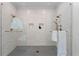 Modern bathroom features a glass shower, dual shower heads, and neutral tile at 1811 Fountain Hill Ct, Duluth, GA 30097