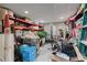 Unfinished basement used as storage with shelving and multiple containers at 1811 Fountain Hill Ct, Duluth, GA 30097