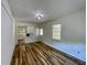 Bright living area showcasing hardwood floors and access to the kitchen area at 2682 Pineland Ave, Atlanta, GA 30340