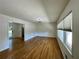 Spacious living room featuring hardwood floors, ample natural light, and neutral walls, perfect for relaxation at 2682 Pineland Ave, Atlanta, GA 30340