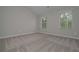 Bedroom featuring a large window providing natural light at 496 Charleston Pl, Villa Rica, GA 30180