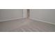 Cozy bedroom with neutral walls and plush carpet flooring at 496 Charleston Pl, Villa Rica, GA 30180