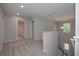Second floor hallway leading to various rooms and a staircase at 496 Charleston Pl, Villa Rica, GA 30180