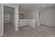 Upstairs hallway with neutral carpet leads to various rooms at 496 Charleston Pl, Villa Rica, GA 30180