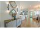 Modern living space featuring a sideboard, wall decor, and access to other areas of the home at 1272 N Highland Ne Ave, Atlanta, GA 30306