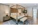 An additional view of the main bedroom showing a sitting area, four-post bed, and ample closet space at 1272 N Highland Ne Ave, Atlanta, GA 30306