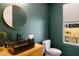 Contemporary powder bath with vessel sink, modern fixtures and natural light at 2641 Drew Valley Ne Rd, Brookhaven, GA 30319