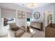 Charming Bedroom features soft colors, rocking chair, natural wood crib, and decor, creating a calming environment at 2641 Drew Valley Ne Rd, Brookhaven, GA 30319