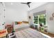 Bright bedroom featuring a trundle bed, a large window and colorful decor at 2641 Drew Valley Ne Rd, Brookhaven, GA 30319