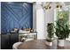Wet bar featured in the dining area with a statement lighting and a view of the yard at 2641 Drew Valley Ne Rd, Brookhaven, GA 30319