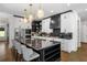 Modern kitchen featuring an island, stainless steel appliances, and pendant lighting at 2641 Drew Valley Ne Rd, Brookhaven, GA 30319
