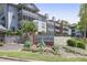 Community sign for Weatherstone Condominiums, with landscaping at 1244 Weatherstone Ne Dr, Atlanta, GA 30324