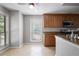 Bright eat-in kitchen with stainless steel appliances, granite countertops, and large windows at 1244 Weatherstone Ne Dr, Atlanta, GA 30324