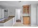 Kitchen features granite counters, stainless faucet and lots of cabinets at 1244 Weatherstone Ne Dr, Atlanta, GA 30324