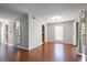 Bright living room with hardwood floors and ample natural light, seamlessly connected to other rooms at 1244 Weatherstone Ne Dr, Atlanta, GA 30324