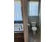 Clean bathroom showcasing a deep soaking tub and toilet, exuding tranquility and functionality at 134 Sierra Cir, Woodstock, GA 30188