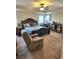 Large primary bedroom featuring a ceiling fan, carpet flooring and a comfortable chair at 134 Sierra Cir, Woodstock, GA 30188