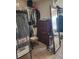 Walk-in closet with organized clothing racks, a wooden dresser, and full-length mirror at 134 Sierra Cir, Woodstock, GA 30188