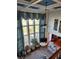 Upstairs view showcasing the living room's high ceilings, large windows, and unique decorative elements at 134 Sierra Cir, Woodstock, GA 30188