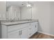 Bathroom featuring a double vanity with a granite countertop and modern fixtures at 2861 Fareed, Douglasville, GA 30135