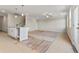 Expansive living area features bright, neutral tones and a central island for seamless socializing at 2861 Fareed, Douglasville, GA 30135