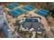 Overhead view of the community tennis courts, pool, clubhouse, and parking at 2861 Fareed, Douglasville, GA 30135