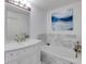 Relaxing bathroom showcasing a soaking tub, marble accents, and stylish vanity at 4246 River Green Nw Dr # 202, Atlanta, GA 30327