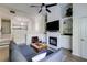 Bright and airy living room with a fireplace, built-in shelving, and comfortable seating at 4246 River Green Nw Dr # 202, Atlanta, GA 30327