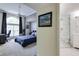 Spacious main bedroom with ensuite bathroom featuring a large window for ample natural light at 4246 River Green Nw Dr # 202, Atlanta, GA 30327