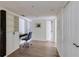Office space with wood floors, built-in shelving and cabinets, desk, and chair at 4246 River Green Nw Dr # 202, Atlanta, GA 30327
