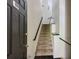 Inviting entry staircase with elegant railings and tile flooring at 4246 River Green Nw Dr # 202, Atlanta, GA 30327